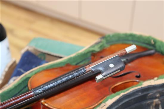 A German three-quarter size violin and bow, cased